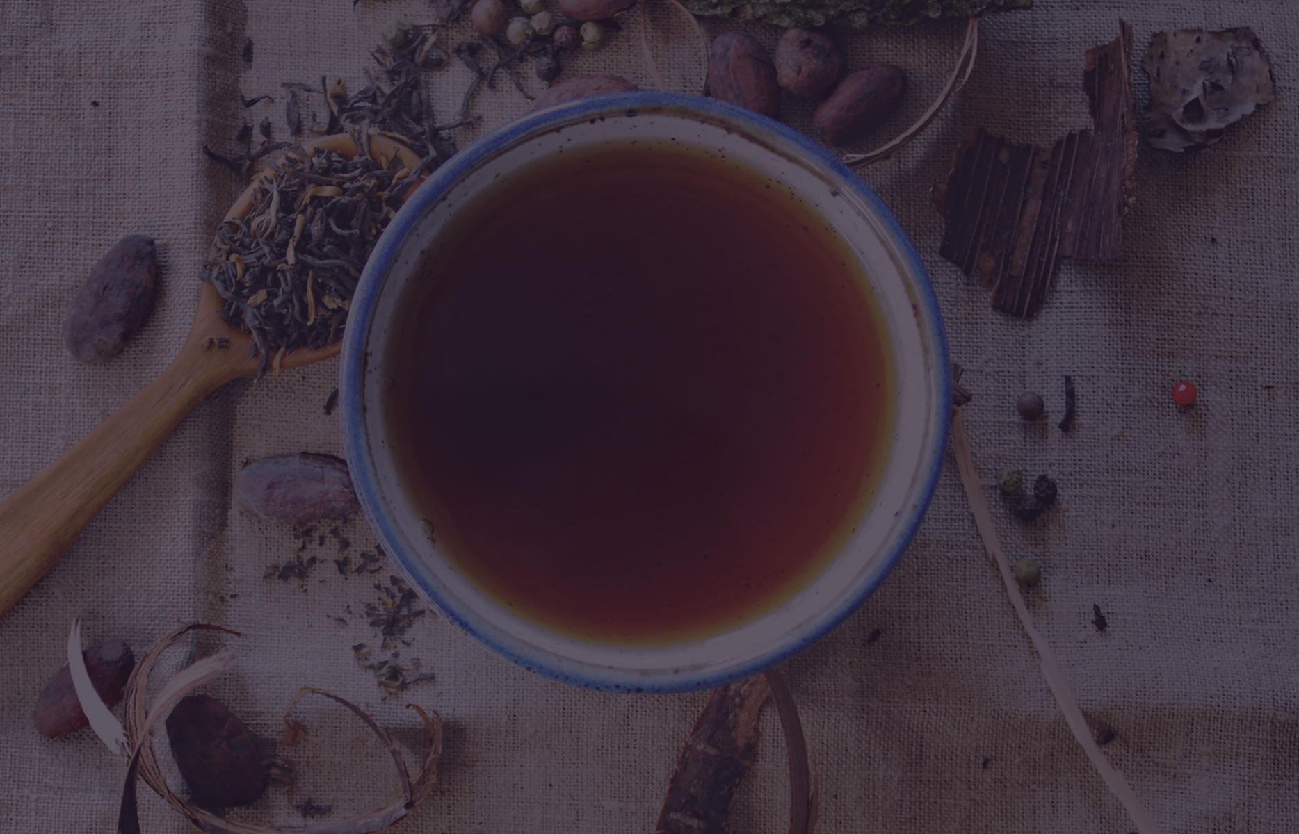 tea and dried herbs laid out on a table